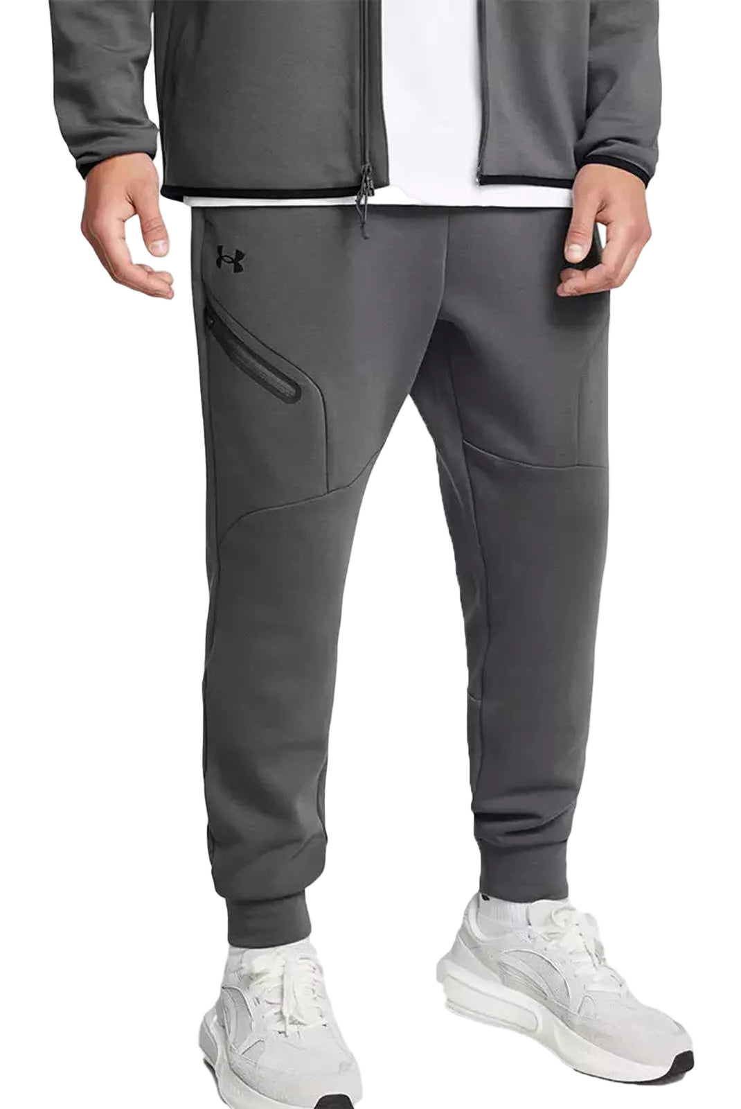Jogging Under Armour homme gris avec coupe fuselée et poches latérales