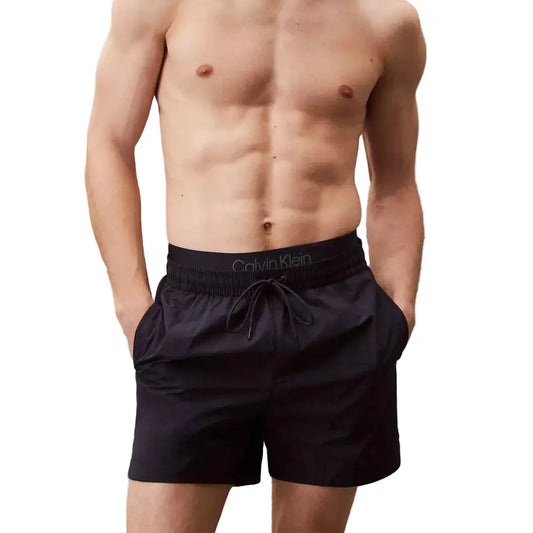 Short de bain Calvin Klein bleu marine Dark Sapphire, vue de face avec logo apparent